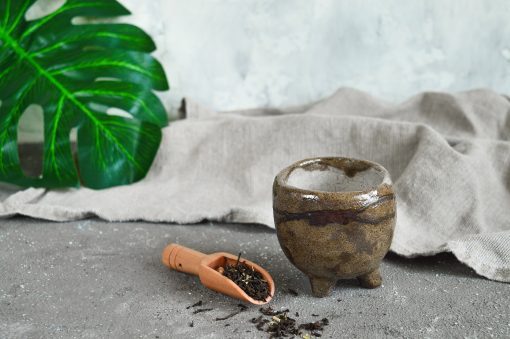 Ceramic tea cup Japanese wabi sabi style. Handmade ceramic tableware. Clay utensils. Ecology concept